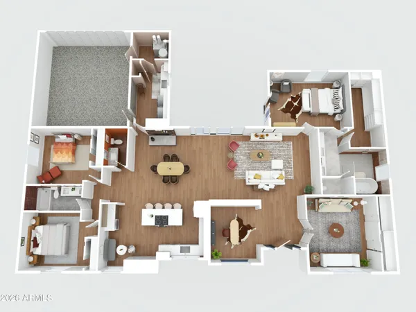an aerial view of a city with lots of residential buildings and mountain view in back
