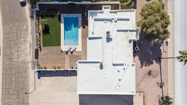 an aerial view of residential house and outdoor space