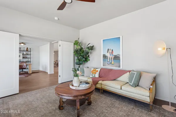 a bedroom with furniture and a table