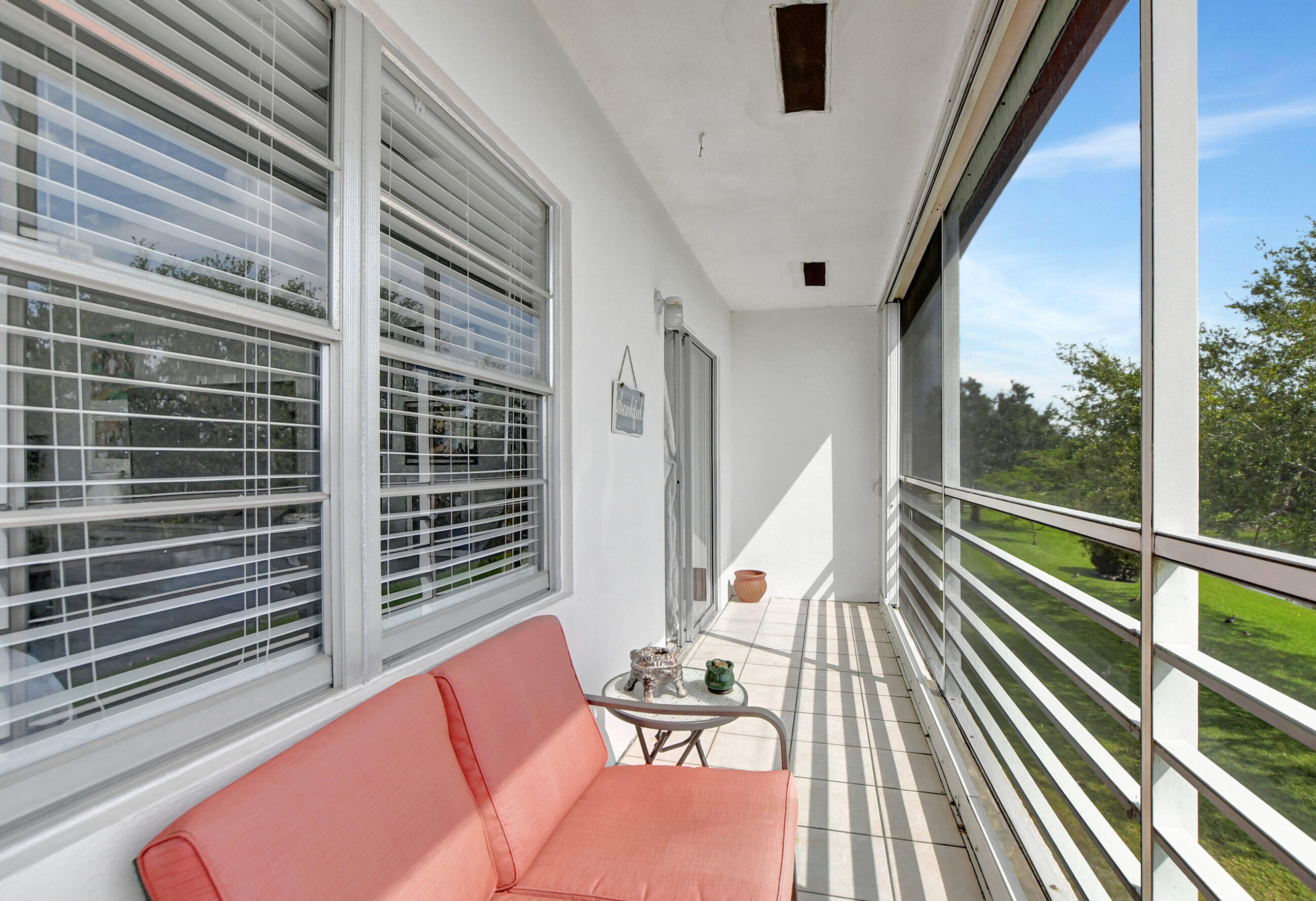 42 Brighton A Boca Raton, FL 33434 - Photo 19 of 24 a balcony view with a couch
