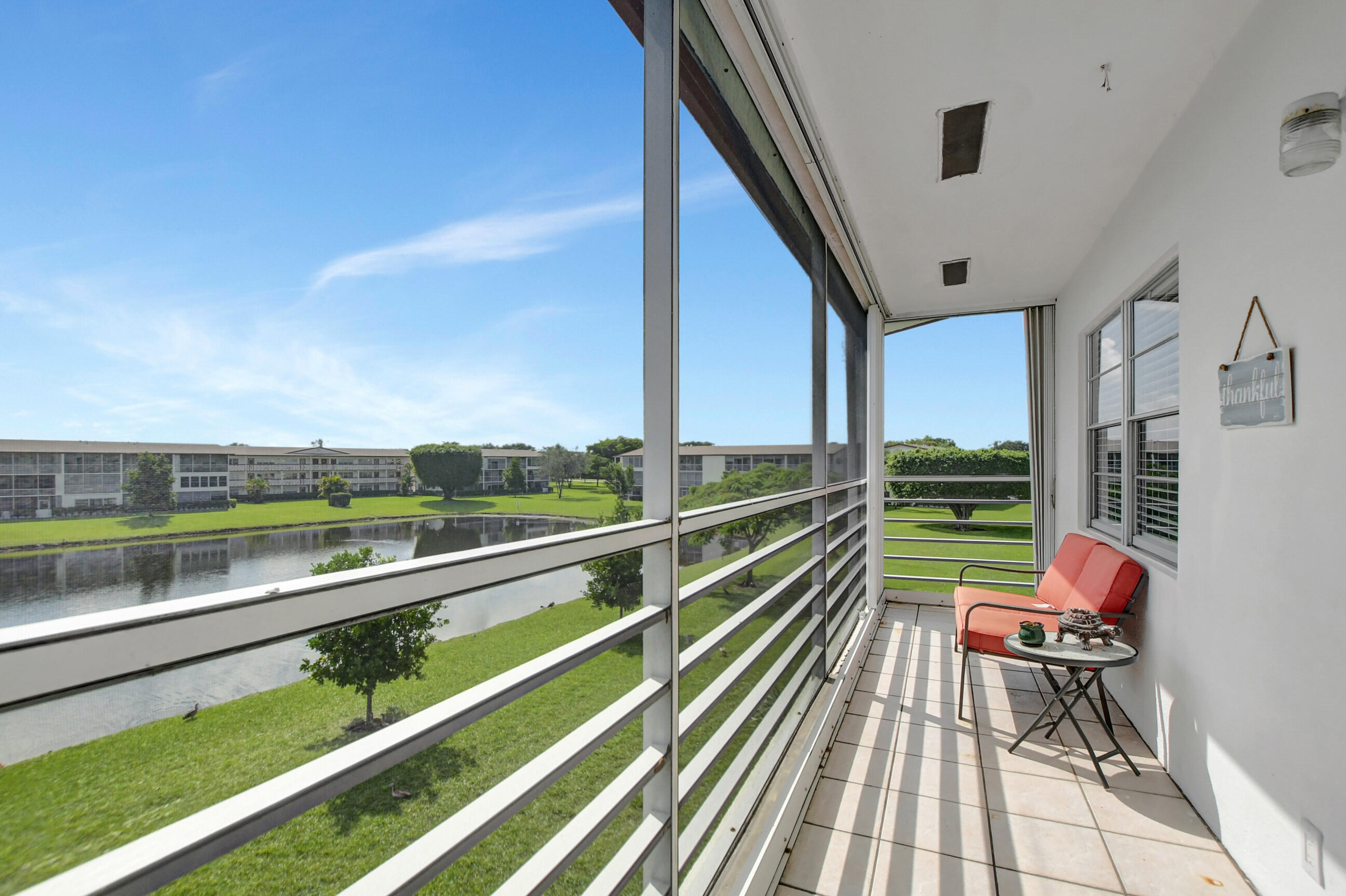 42 Brighton A Boca Raton, FL 33434 - Photo 20 of 24 a view of two chairs in a balcony