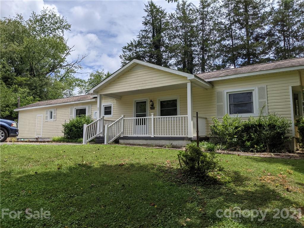 204 Water Filter Plant Road Morganton, NC 28655 - Photo 1 of 13 a front view of house with yard and green space