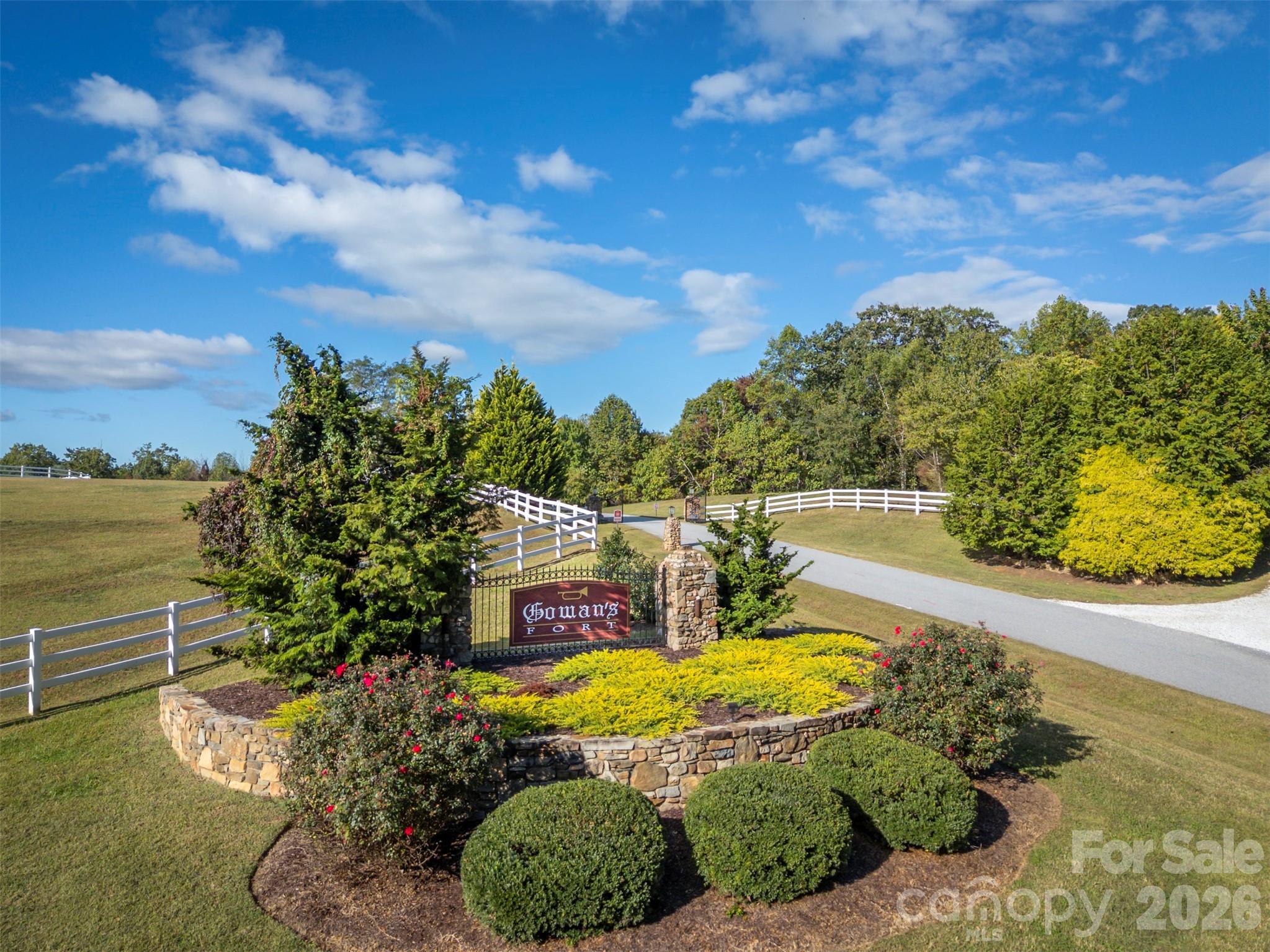 100 Pardo Road Landrum, SC 29356 - Photo 16 of 20 a view of a swimming pool with a yard