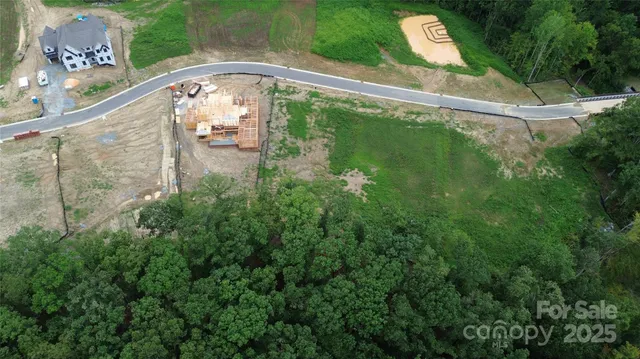a view of a swimming pool with a balcony
