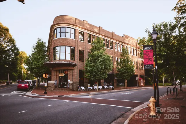 a front view of a building with street view