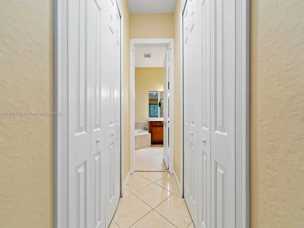 a view of a livingroom and a hallway