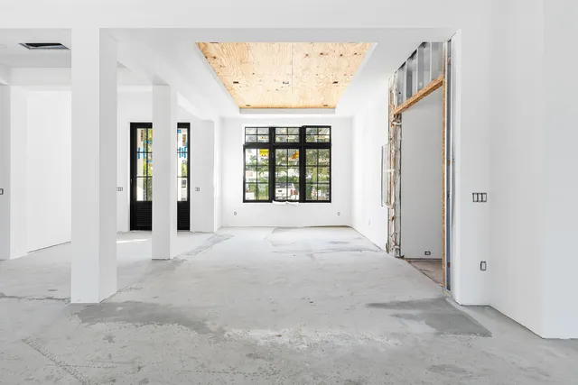 an empty room with windows