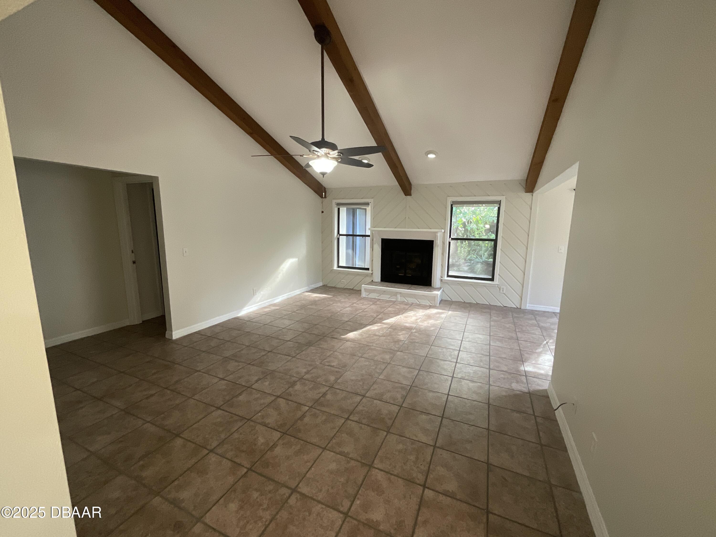 8 Ridge Trail Ormond Beach, FL 32174 - Photo 2 of 24 a view of an empty room with a fireplace