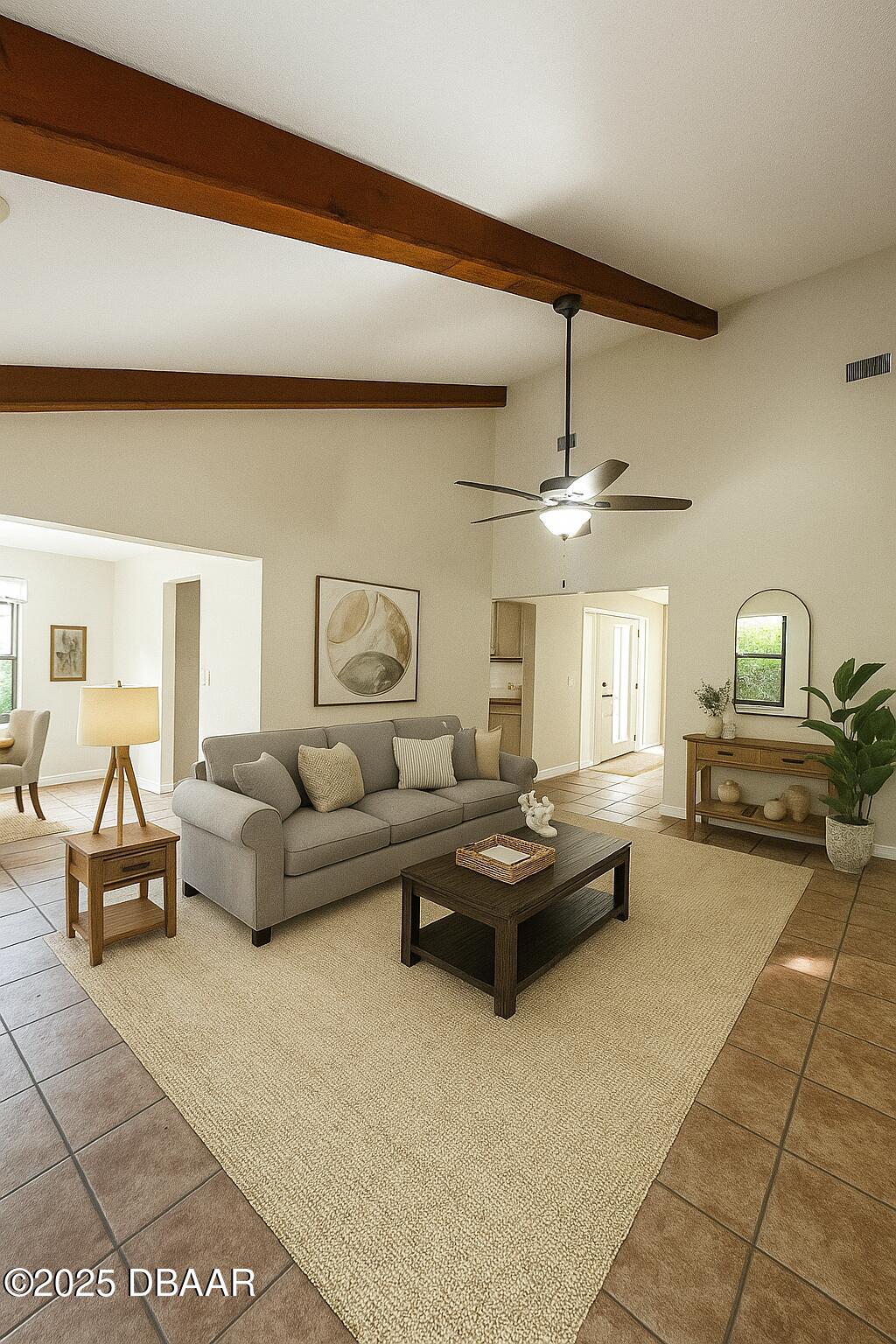 8 Ridge Trail Ormond Beach, FL 32174 - Photo 3 of 24 a living room with furniture and a chandelier