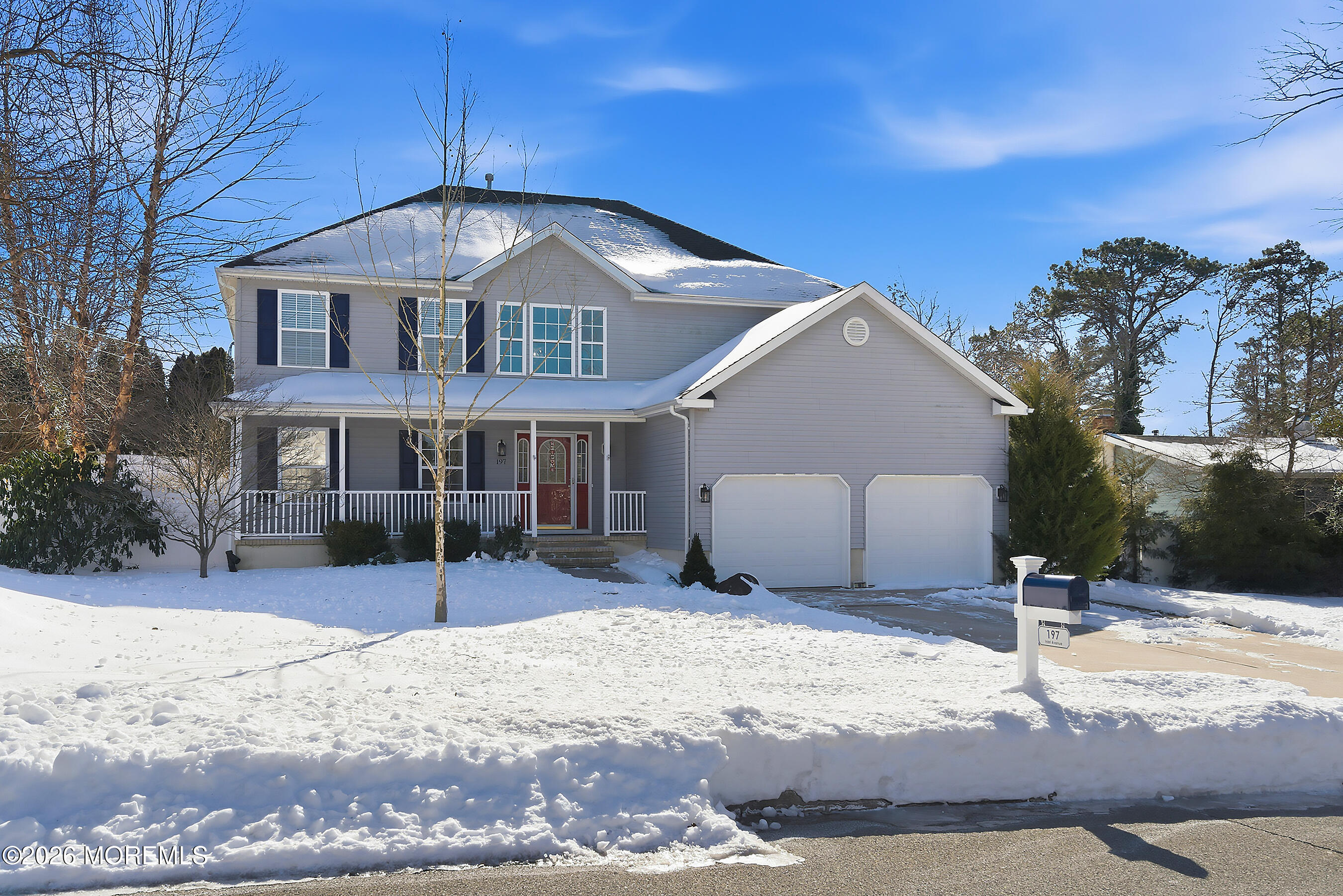 197 Inlet Avenue Manahawkin, NJ 08050 - Photo 1 of 36 a front view of a house with a yard