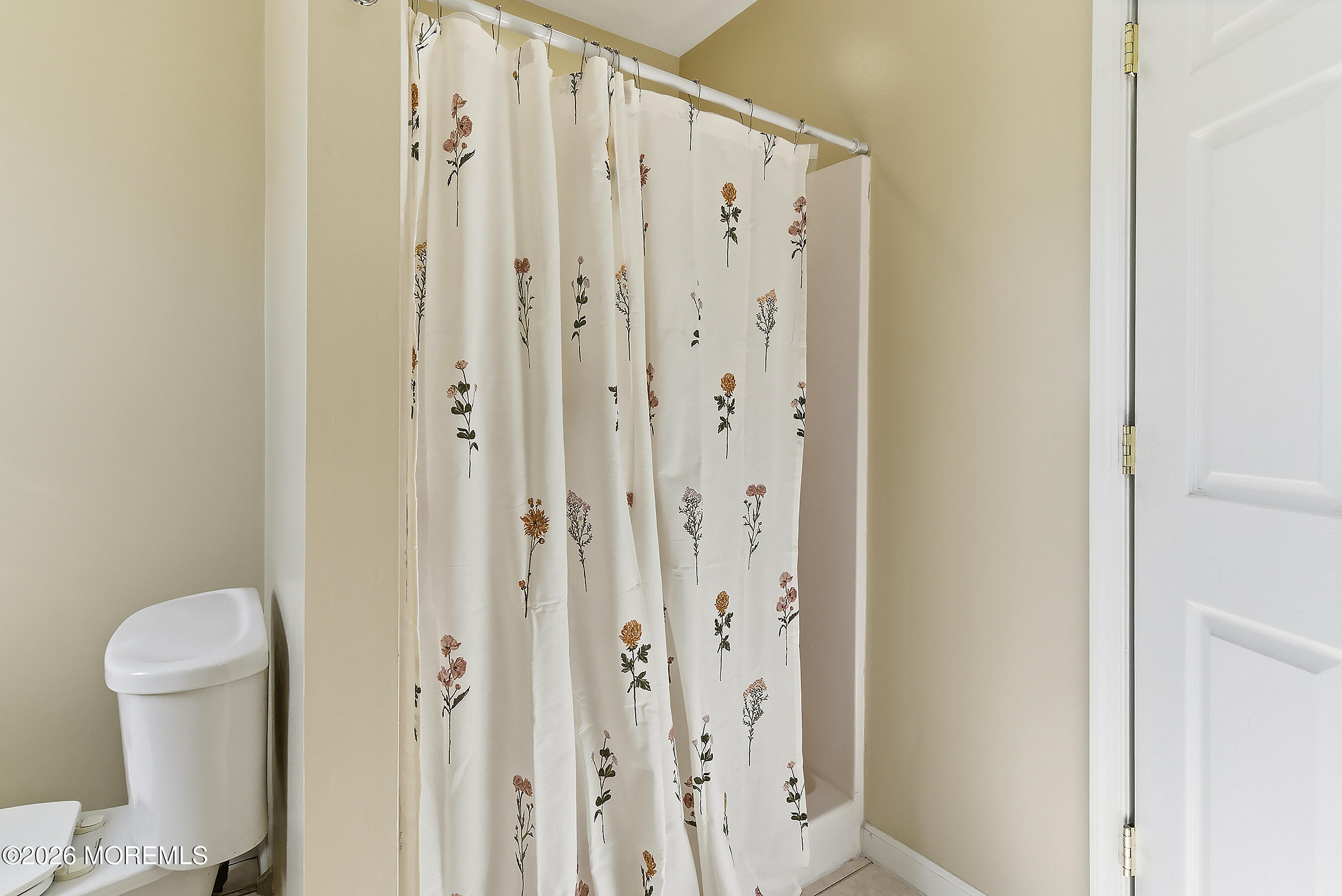 197 Inlet Avenue Manahawkin, NJ 08050 - Photo 27 of 36 a bathroom with a shower curtain