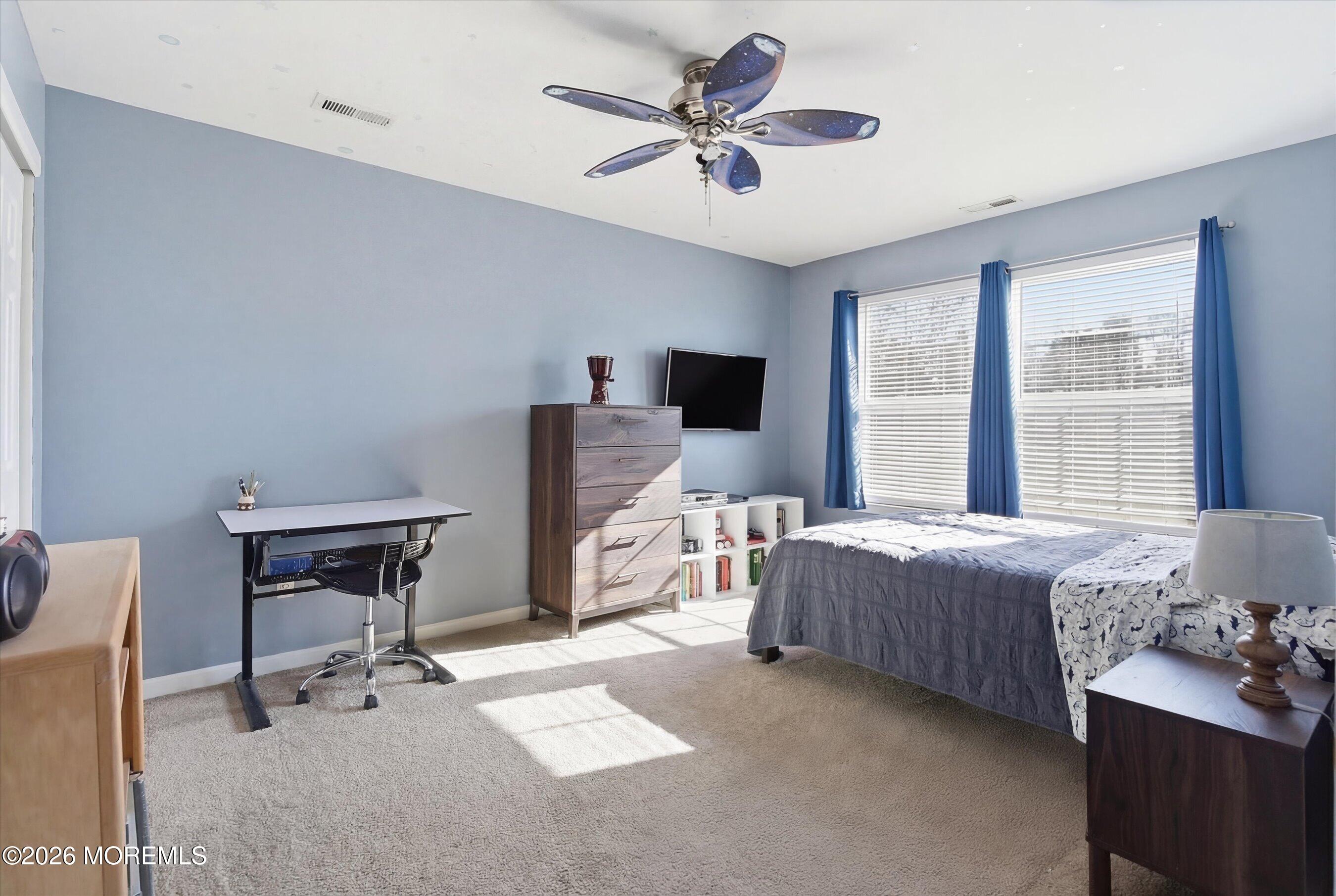 197 Inlet Avenue Manahawkin, NJ 08050 - Photo 28 of 36 a bedroom with furniture and a window