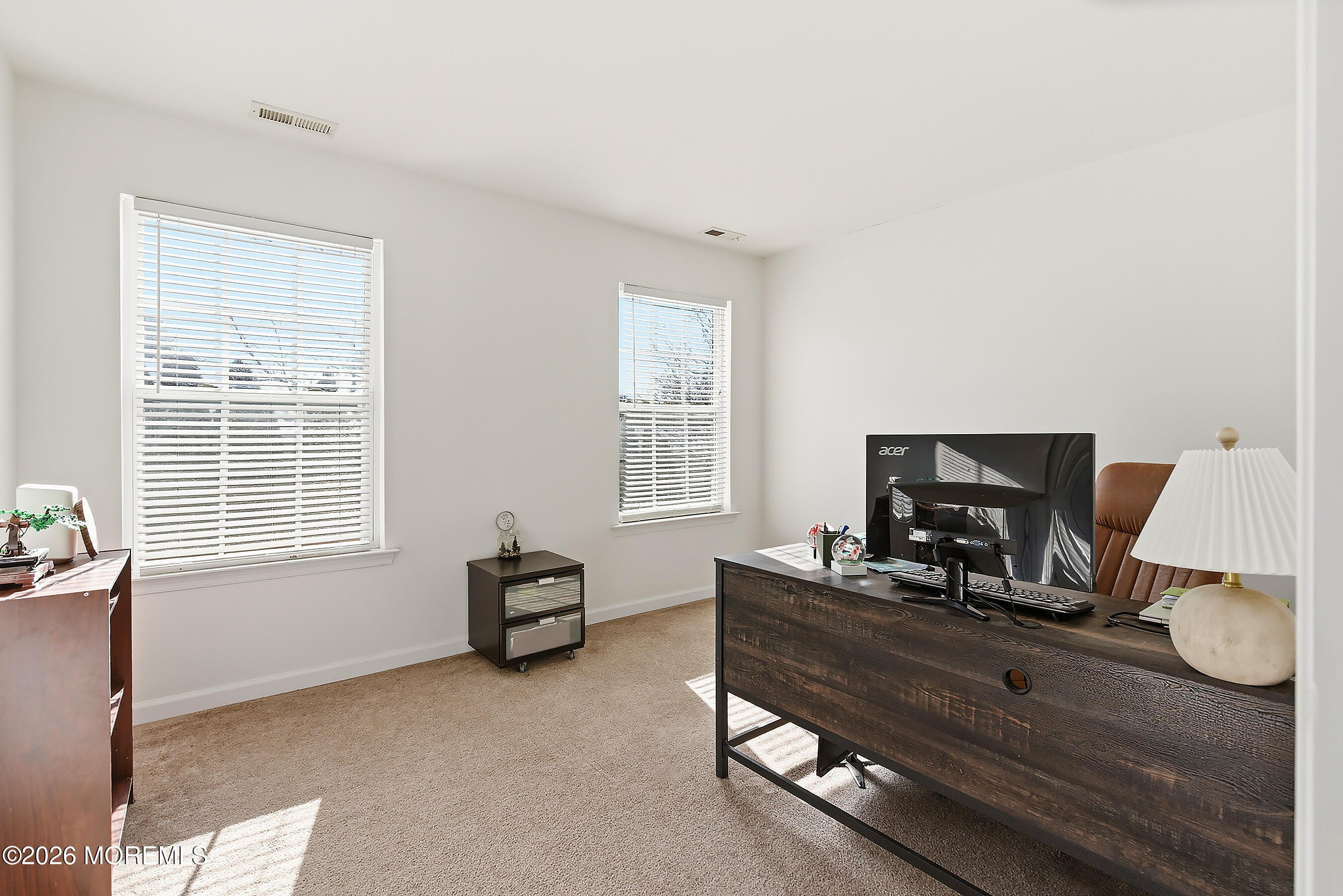 197 Inlet Avenue Manahawkin, NJ 08050 - Photo 30 of 36 a living room with furniture and a window