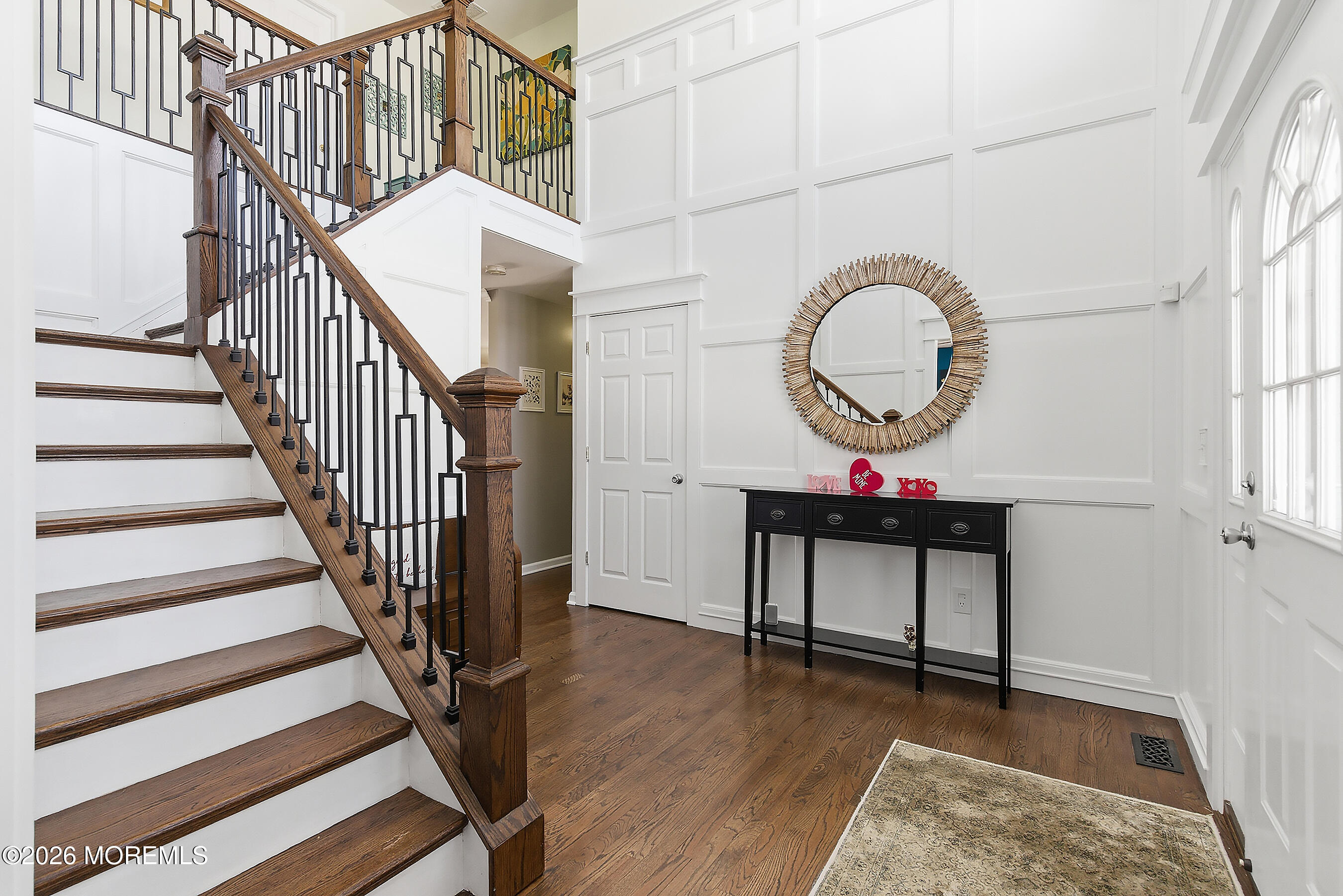 197 Inlet Avenue Manahawkin, NJ 08050 - Photo 3 of 36 a view of entryway dining room and hall with wooden floor