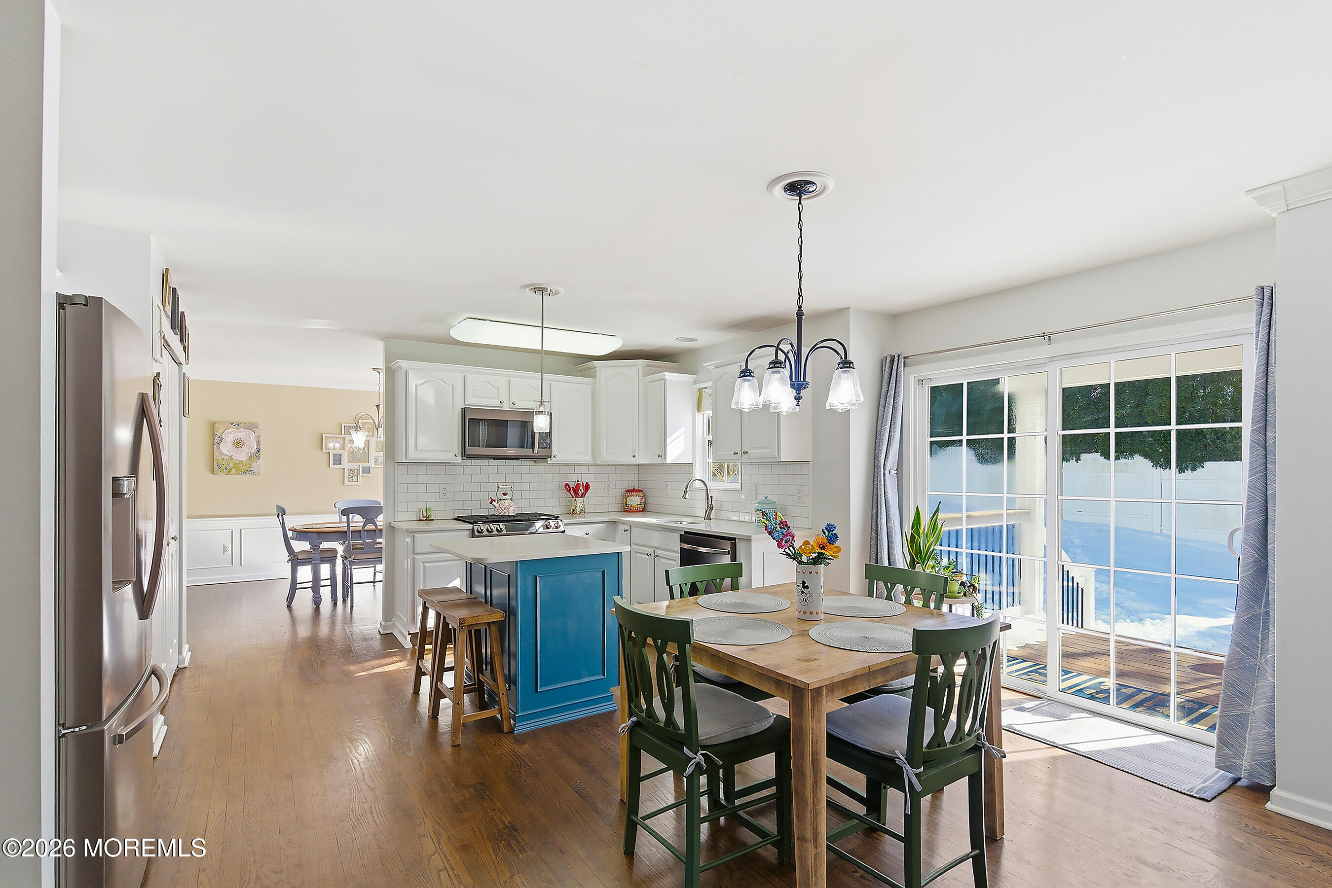 197 Inlet Avenue Manahawkin, NJ 08050 - Photo 8 of 36 a dining room with furniture window and wooden floor