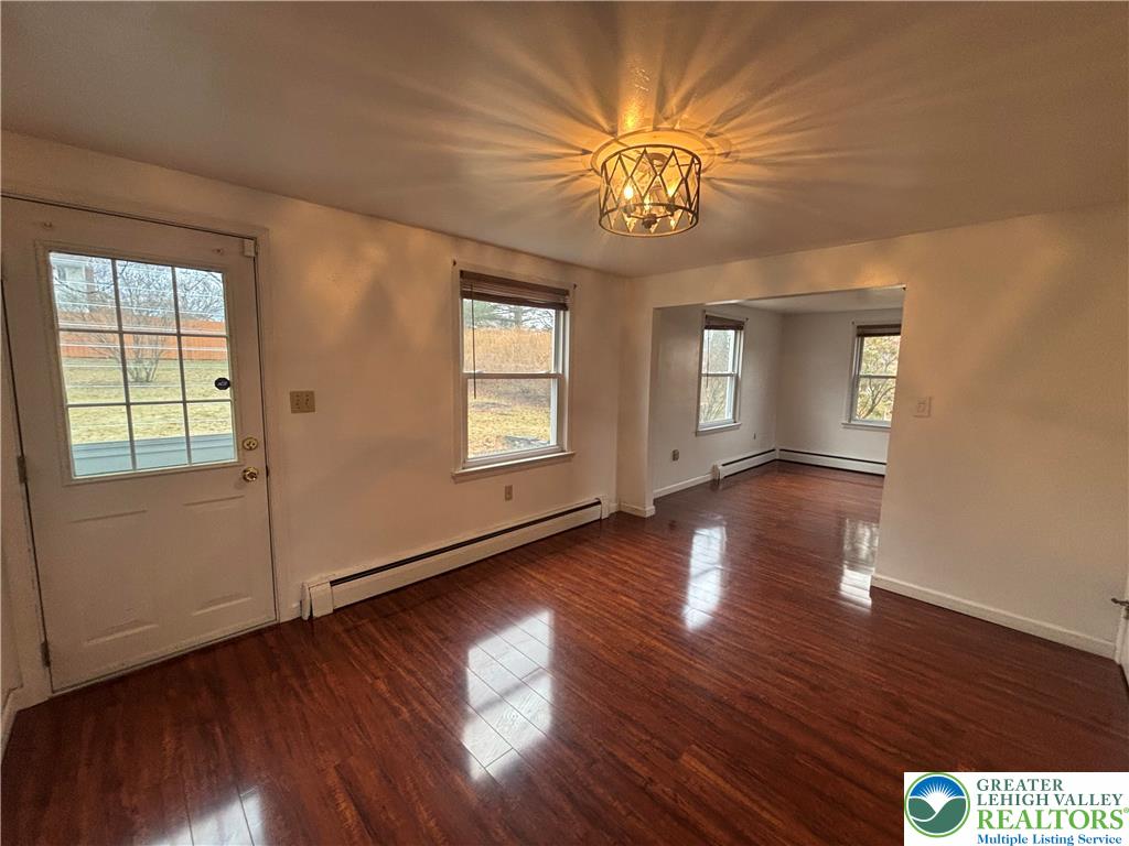 257 East 2nd Street Wind Gap, PA 18091 - Photo 11 of 14 wooden floor in an empty room with a window