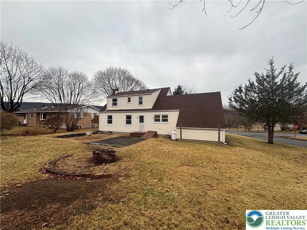 257 East 2nd Street Wind Gap, PA 18091 - Photo 14 of 14 a white house that has a tree in front of it
