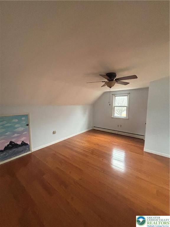 257 East 2nd Street Wind Gap, PA 18091 - Photo 2 of 14 an empty room with wooden floor and windows
