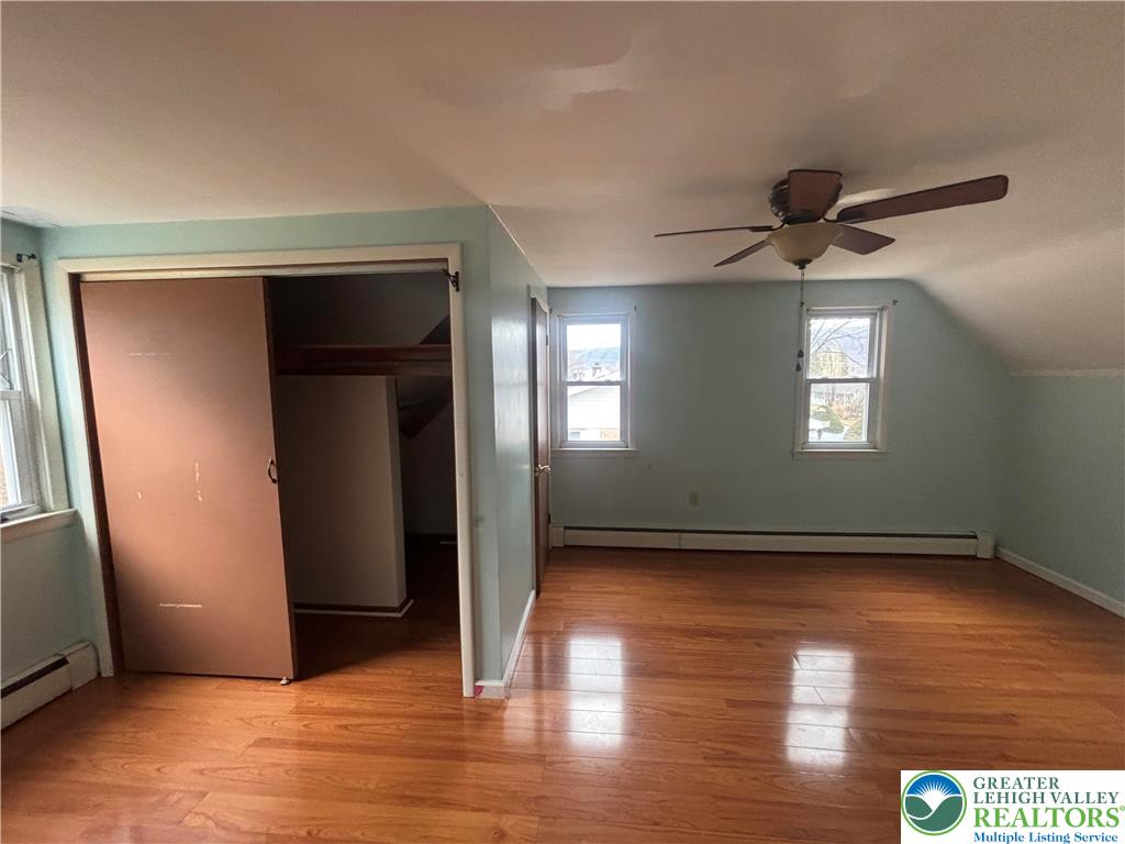 257 East 2nd Street Wind Gap, PA 18091 - Photo 8 of 14 a view of an empty room with wooden floor and a window