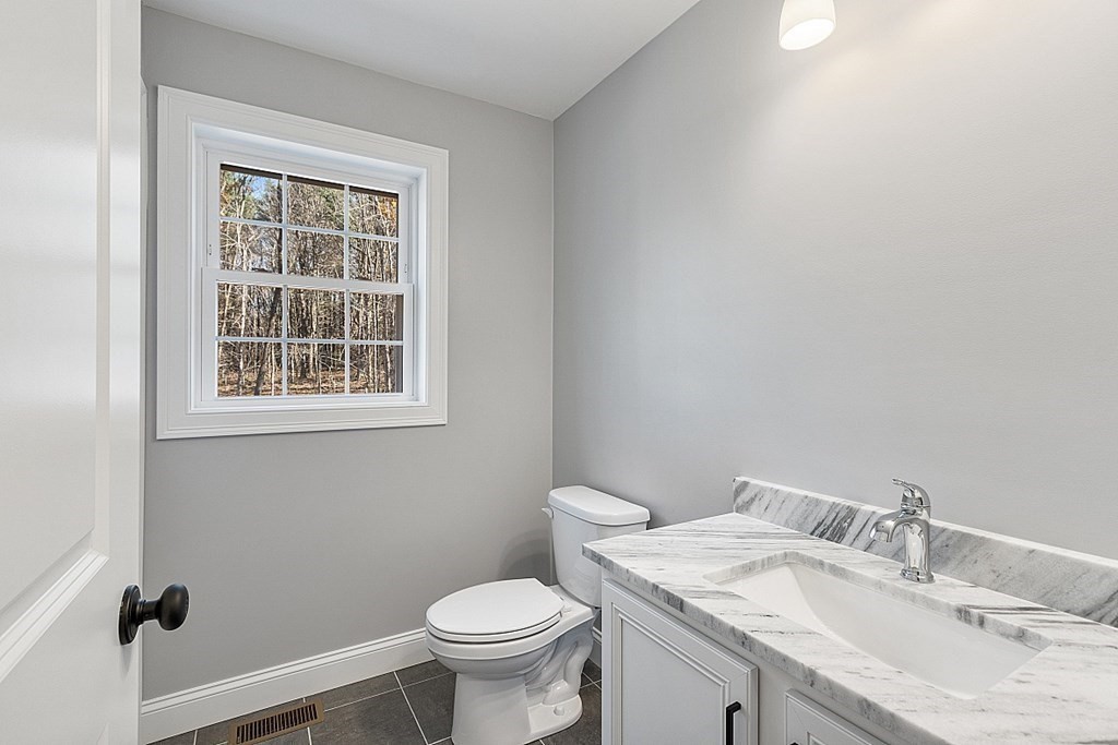 178 French Road, Unit LOT 8 Templeton, MA 01468 - Photo 19 of 39 a bathroom with a sink toilet and window