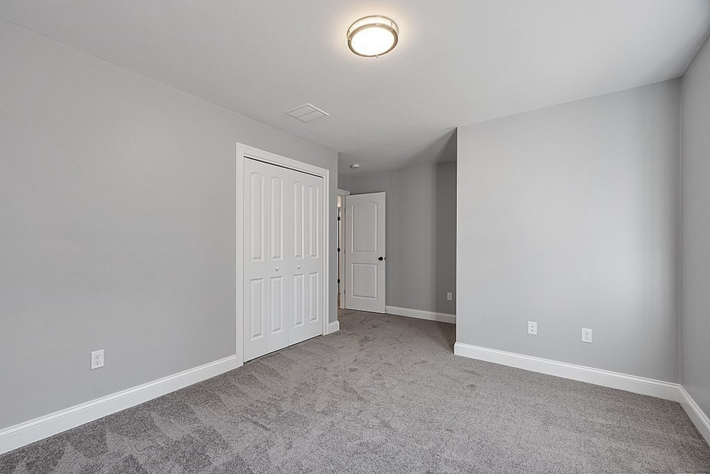 178 French Road, Unit LOT 8 Templeton, MA 01468 - Photo 33 of 39 an empty room with closet area