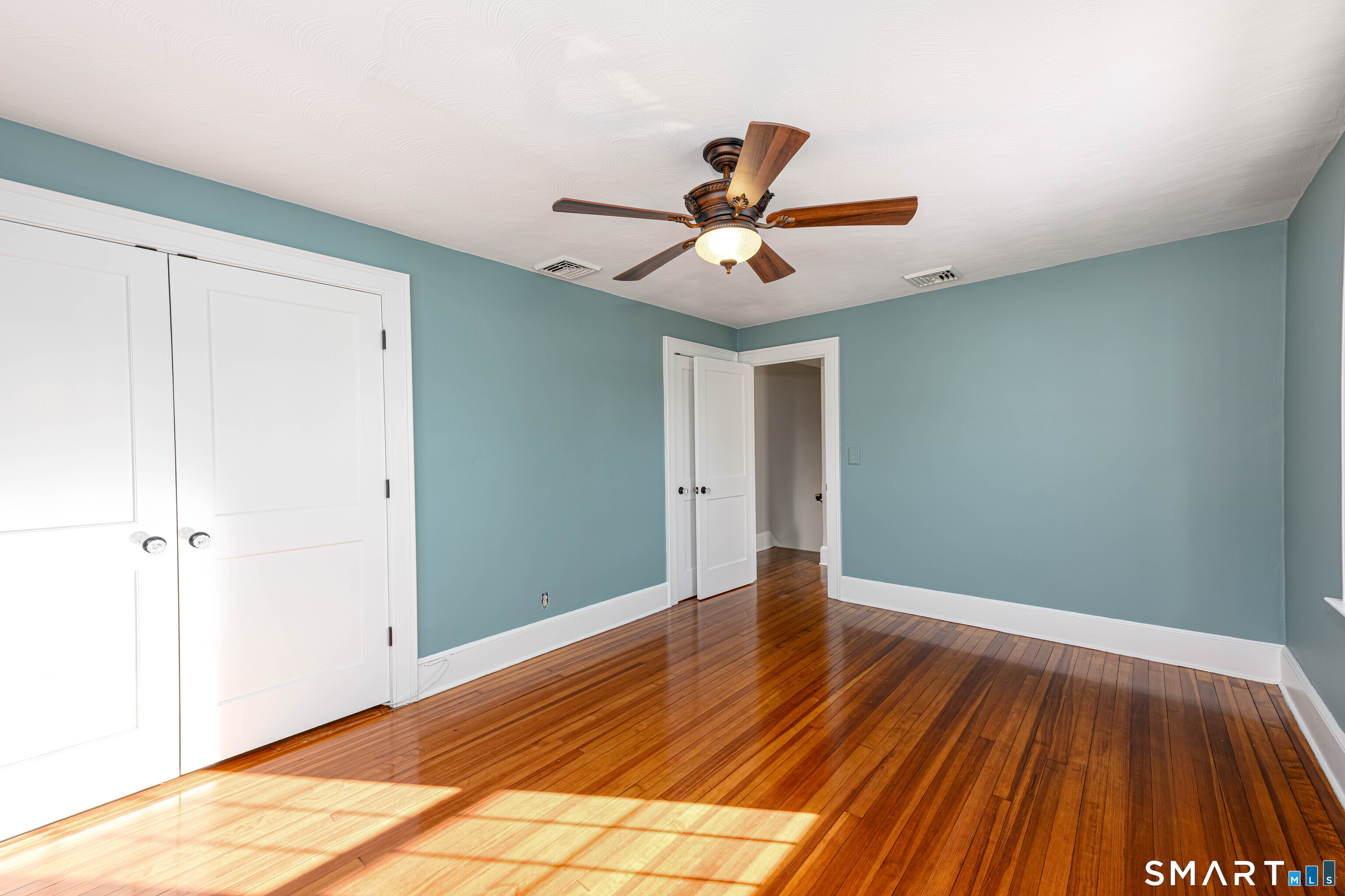 18 Day Spring Avenue Hamden, CT 06518 - Photo 21 of 35 Double door closet with custom built-ins and a second closet (behind entry door) offer ample storage!