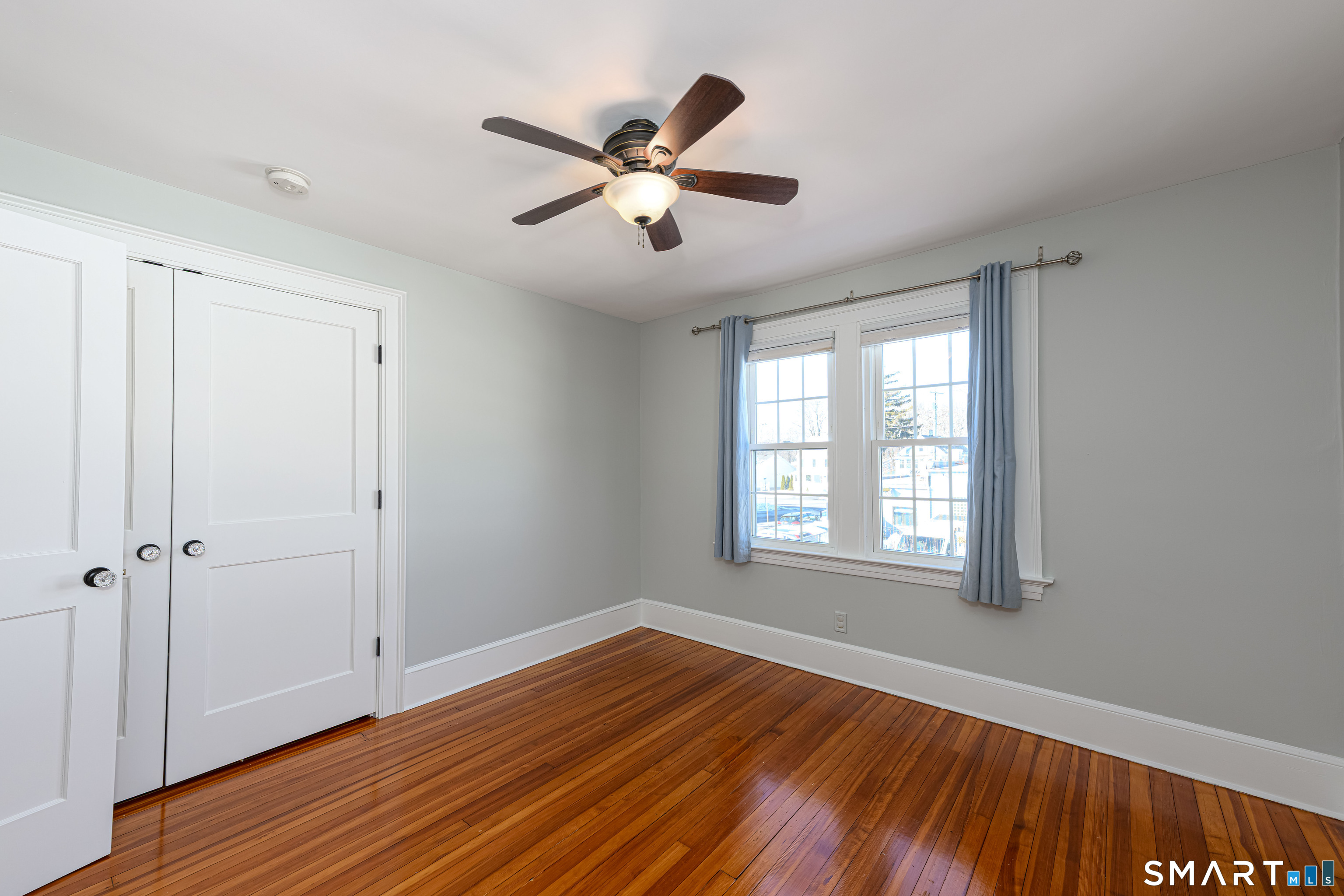 18 Day Spring Avenue Hamden, CT 06518 - Photo 26 of 35 Double door closet with custom closet built-ins inside.