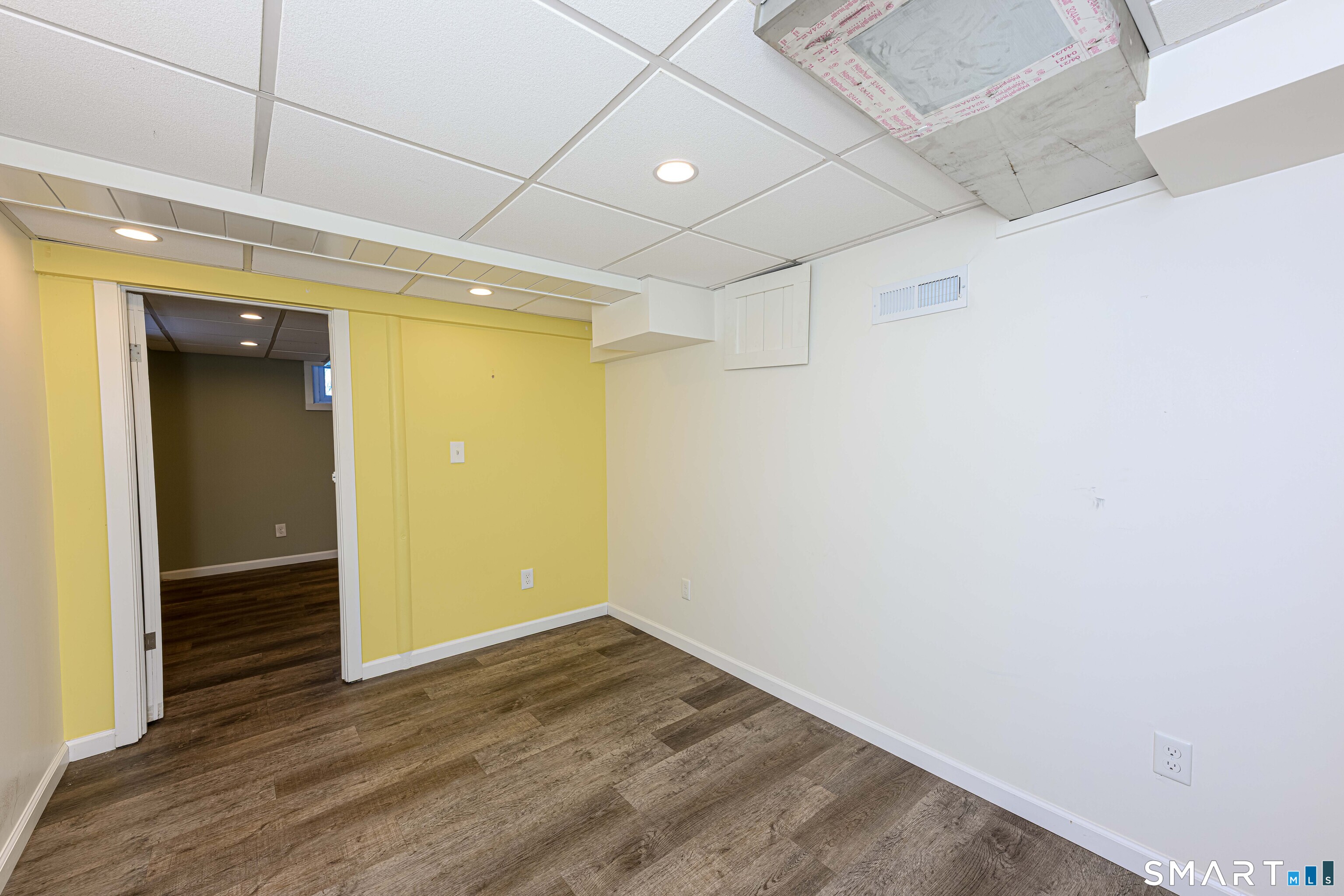 18 Day Spring Avenue Hamden, CT 06518 - Photo 31 of 35 The lower level also offers a guest room or 2nd office for those with work at home or hybrid work models.