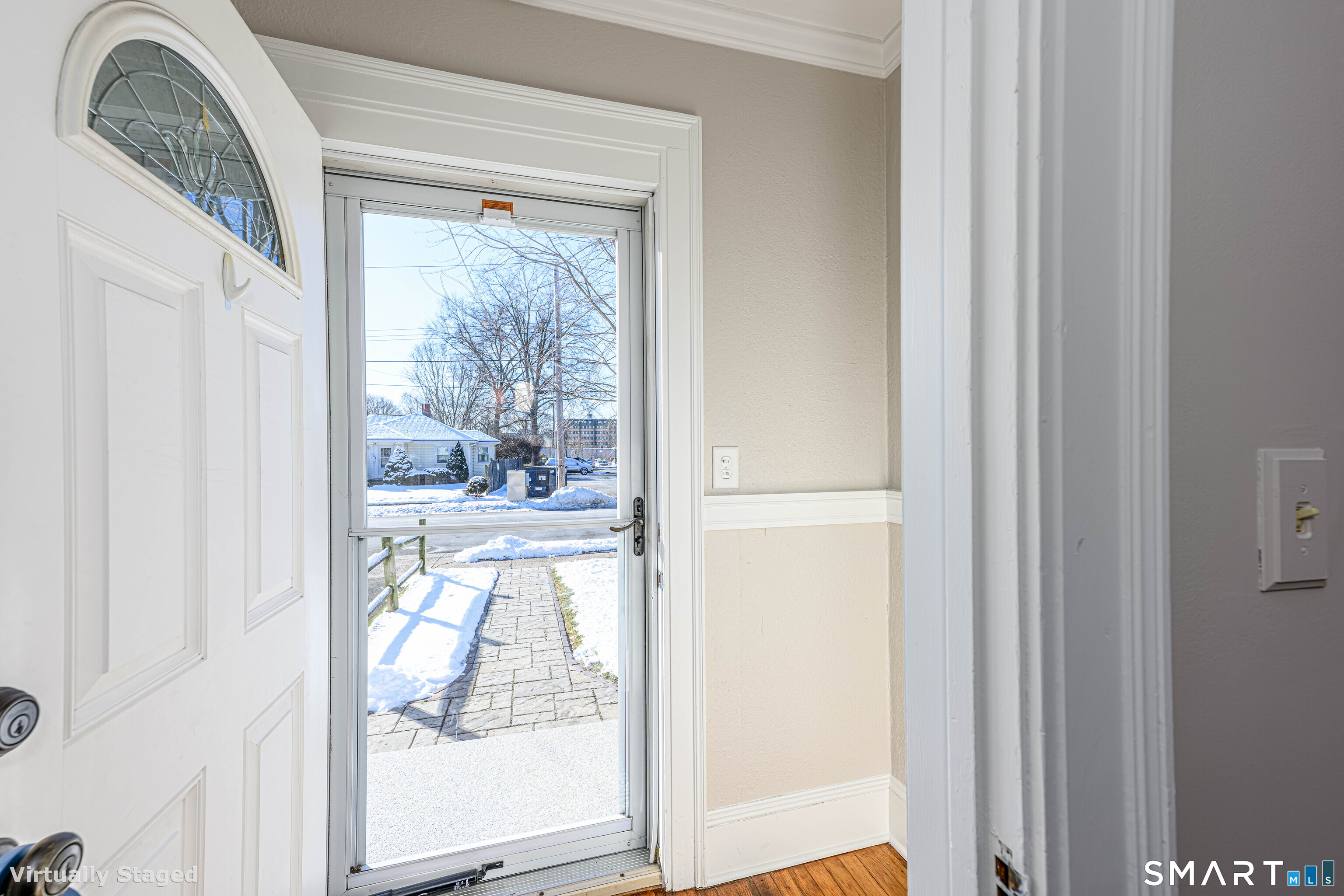 18 Day Spring Avenue Hamden, CT 06518 - Photo 5 of 35 Outer entry foyer with coat closet. French door leads to the inner foyer.