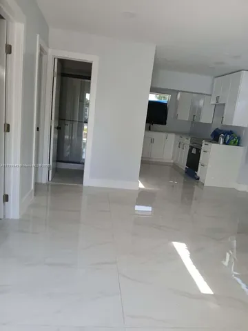 a view of a kitchen cabinets and a couch