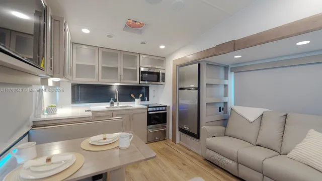 a kitchen with a stove and a sink