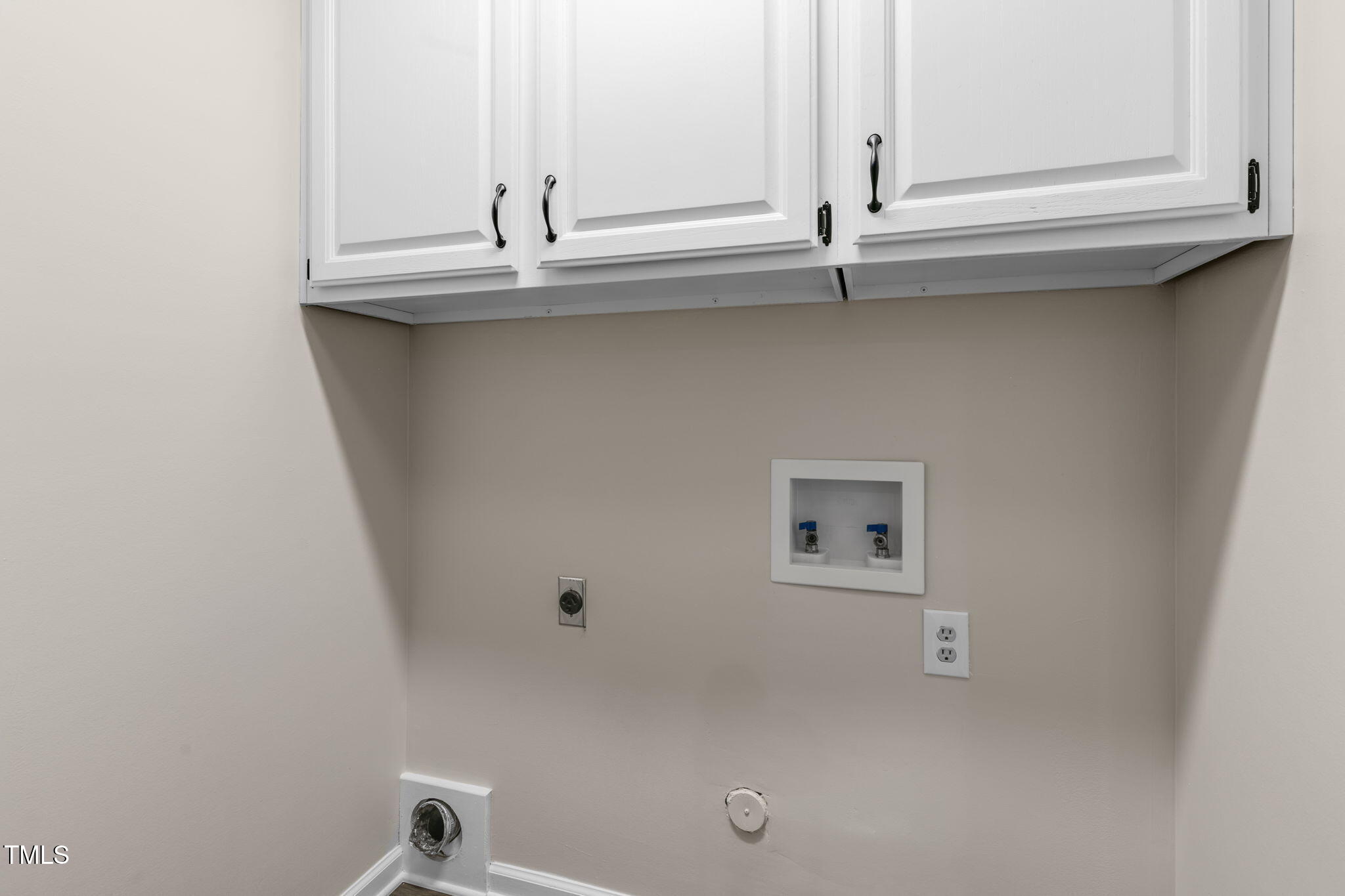 6205 Trevor Court Raleigh, NC 27613 - Photo 25 of 42 Upstairs Laundry
