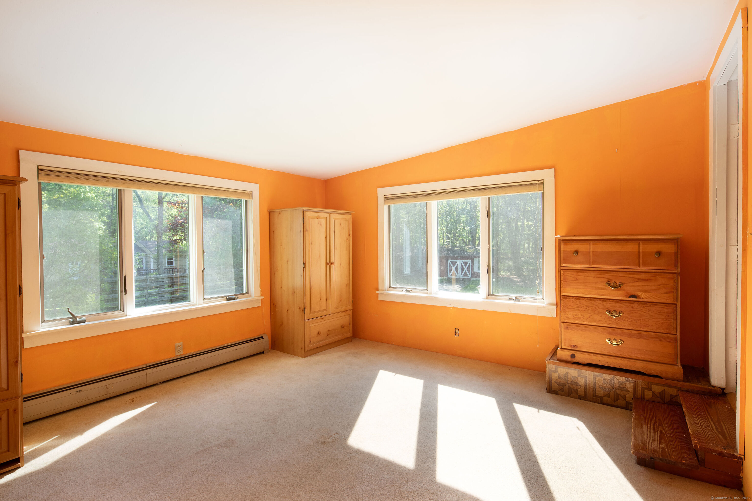 47 East Main Street Salisbury, CT 06068 - Photo 11 of 27 a room with a large window and a bed