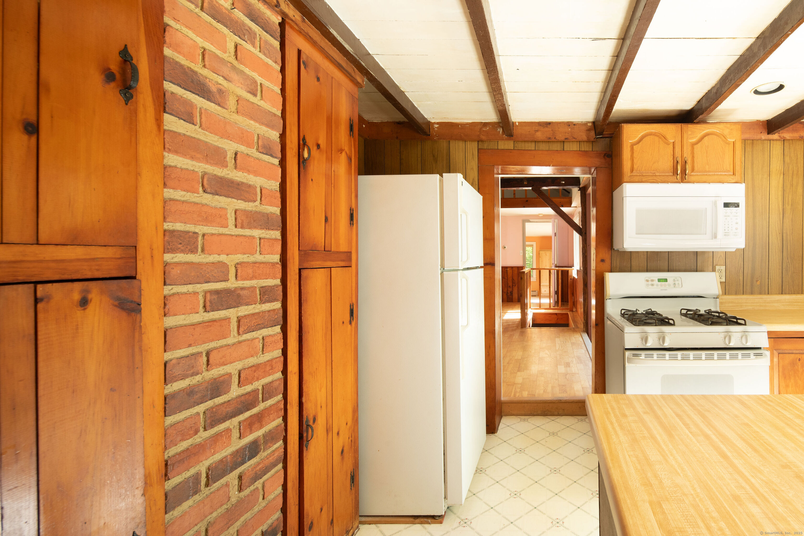 47 East Main Street Salisbury, CT 06068 - Photo 13 of 27 a view of a kitchen with refrigerator and a stove