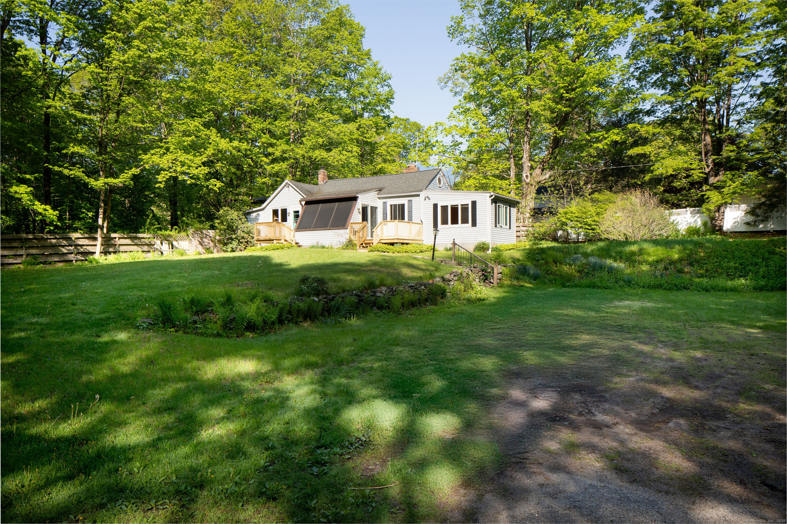 47 East Main Street Salisbury, CT 06068 - Photo 4 of 27 a front view of a house with a yard