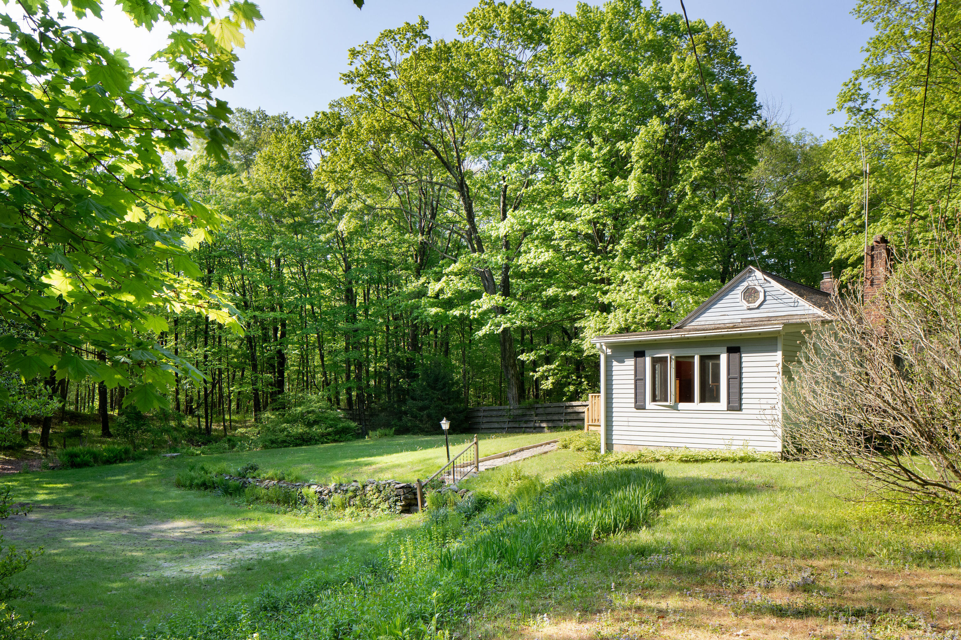 47 East Main Street Salisbury, CT 06068 - Photo 5 of 27 a front view of a house with a yard