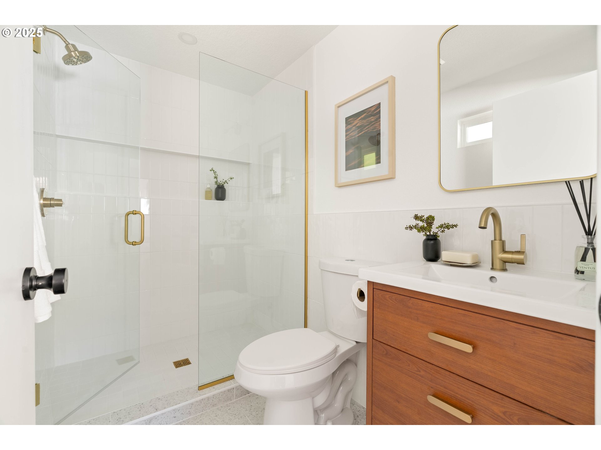 10904 Southwest 62nd Place Portland, OR 97219 - Photo 17 of 27 a bathroom with a sink a toilet and shower