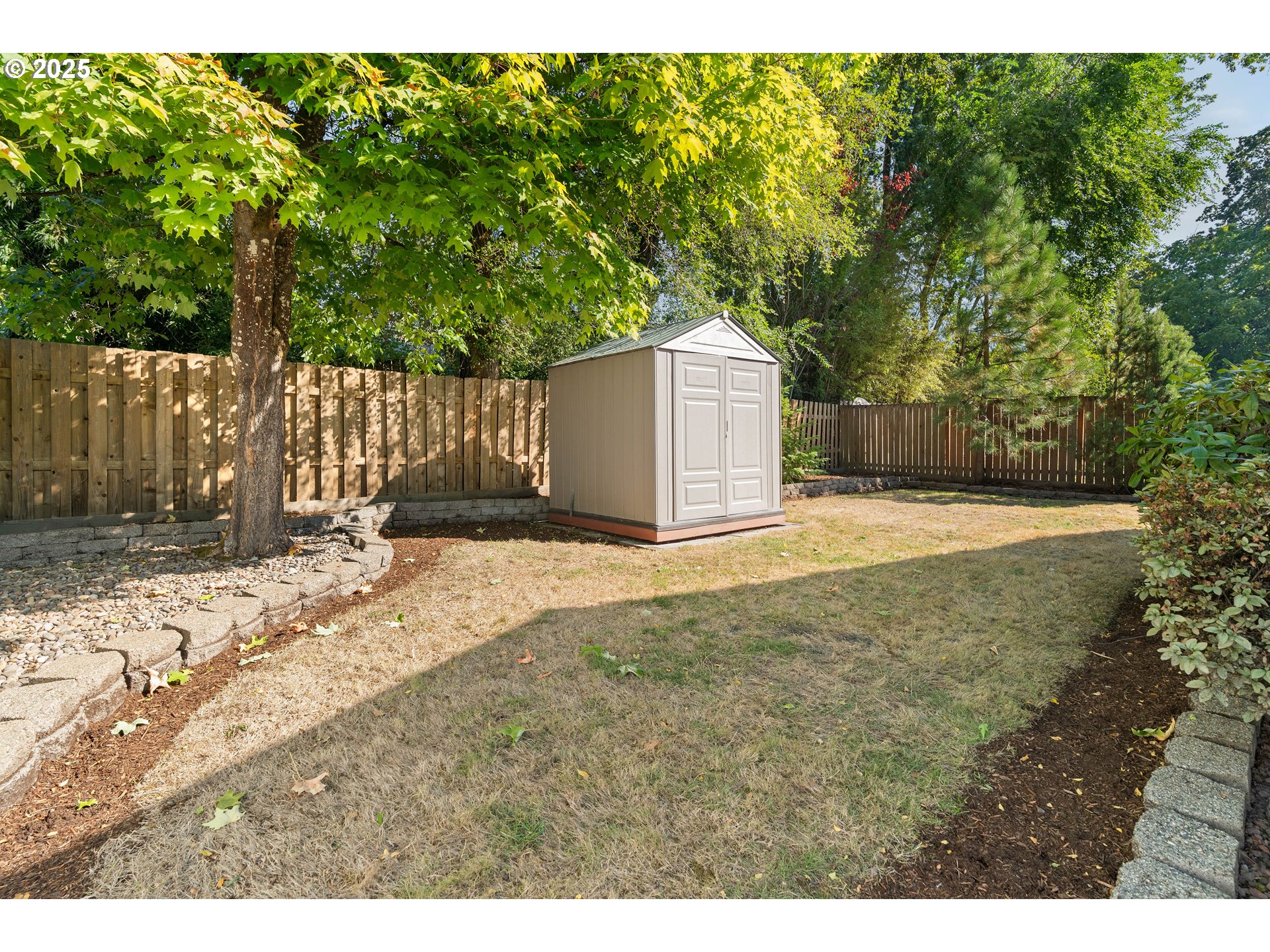 10904 Southwest 62nd Place Portland, OR 97219 - Photo 24 of 27 a view of backyard of house