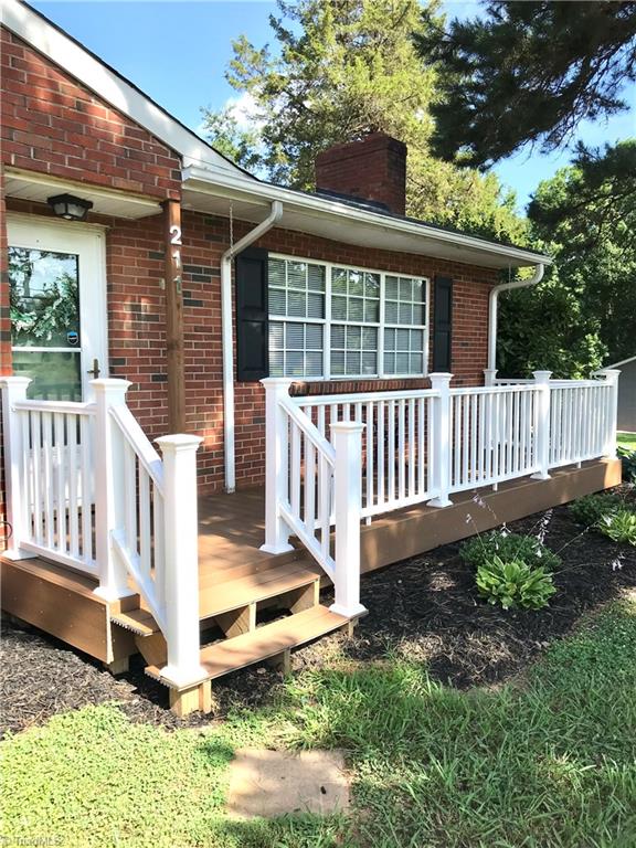 211 Fork Bixby Road Advance, NC 27006 - Photo 2 of 31 Porch has composite decking.