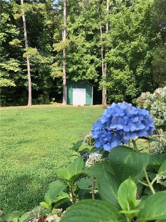 211 Fork Bixby Road Advance, NC 27006 - Photo 29 of 31 Great storage shed for the mowers.