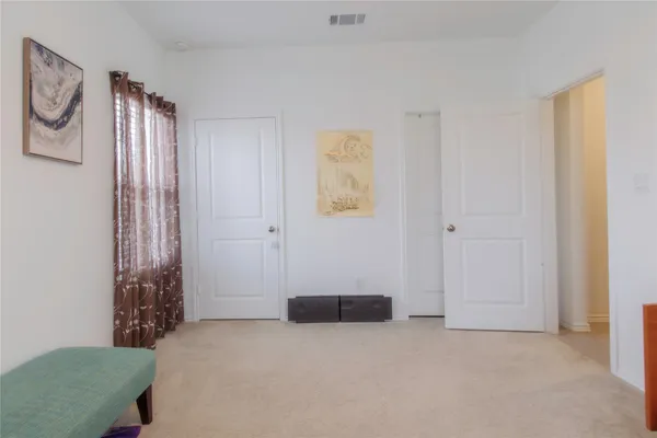a view of livingroom with hardwood floor and workspace