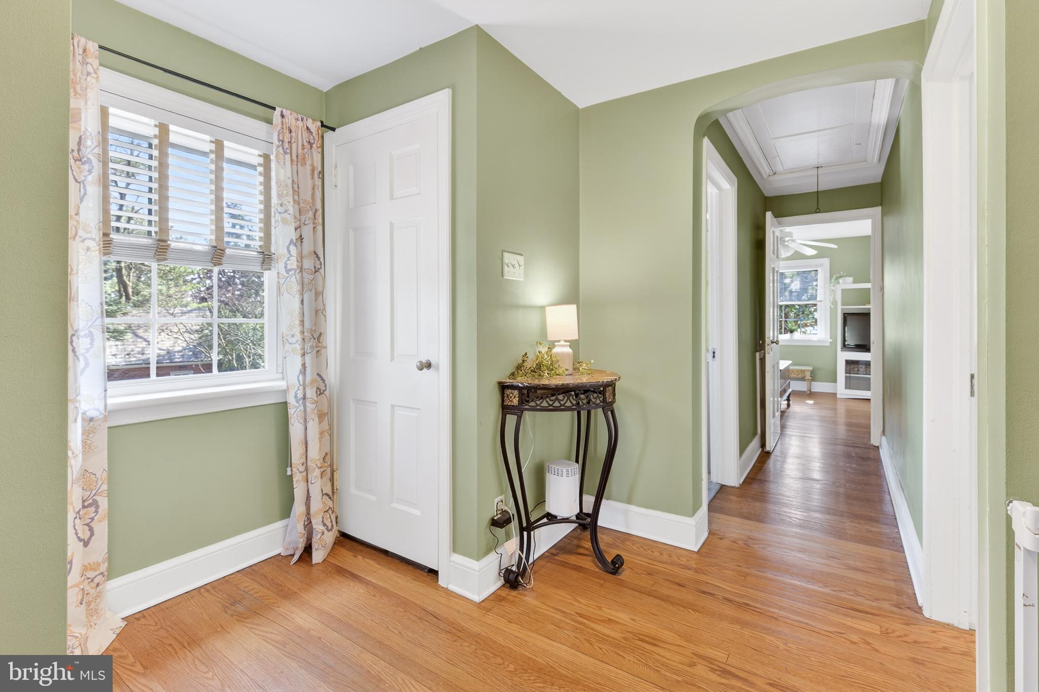 2315 Edgewood Road Harrisburg, PA 17104 - Photo 20 of 41 a view of a hallway with wooden floor and a window