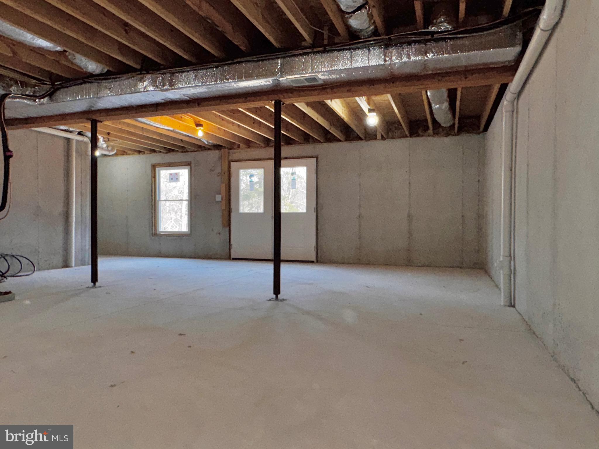 1241 Pine Grove Road Berkeley Springs, WV 25411 - Photo 19 of 19 a view of empty room