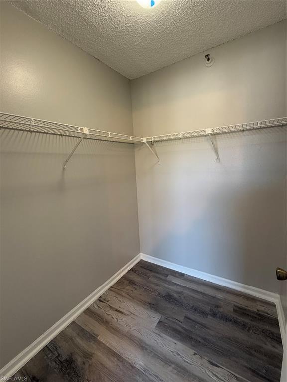 13521 Eagle Ridge Drive, Unit 133 Fort Myers, FL 33912 - Photo 5 of 15 a view of a room with racks on the wall