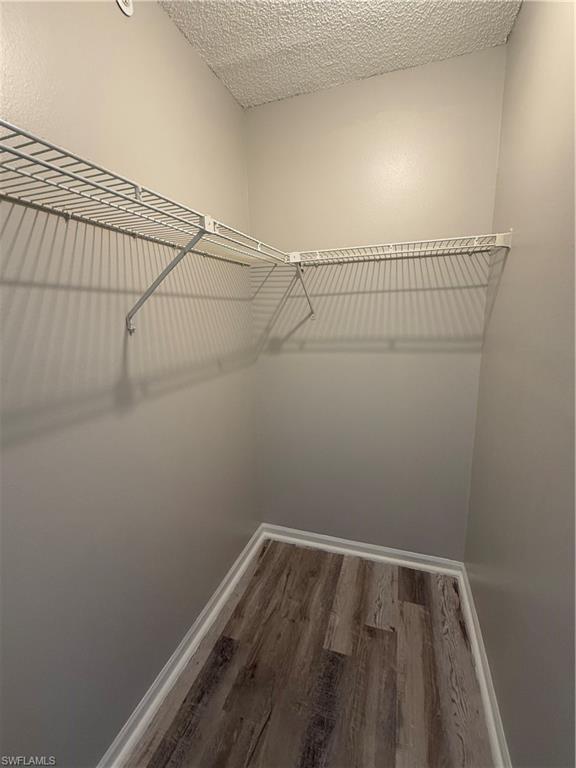 13521 Eagle Ridge Drive, Unit 133 Fort Myers, FL 33912 - Photo 6 of 15 a view of a room with racks on the wall