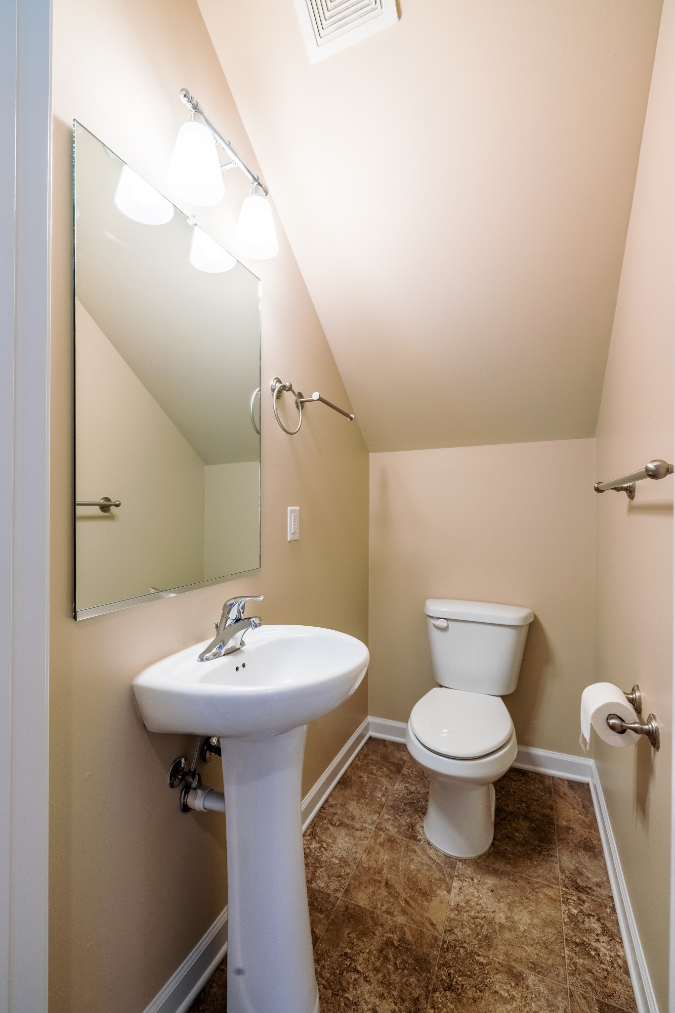 3799 Willow Creek Road Nashville, TN 37207 - Photo 9 of 25 a bathroom with a sink toilet and mirror