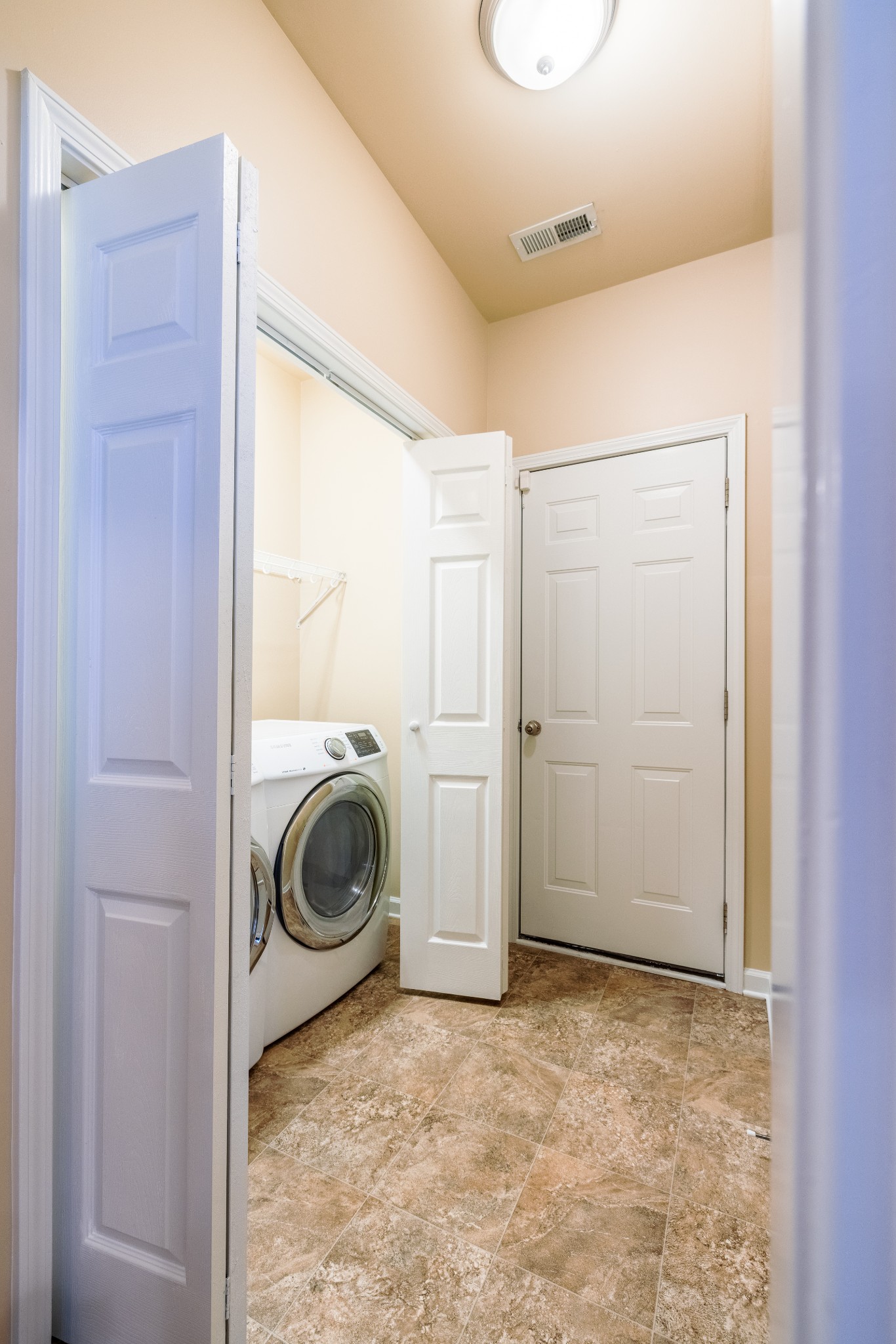3799 Willow Creek Road Nashville, TN 37207 - Photo 10 of 25 a view of a storage & utility room with washer and dryer