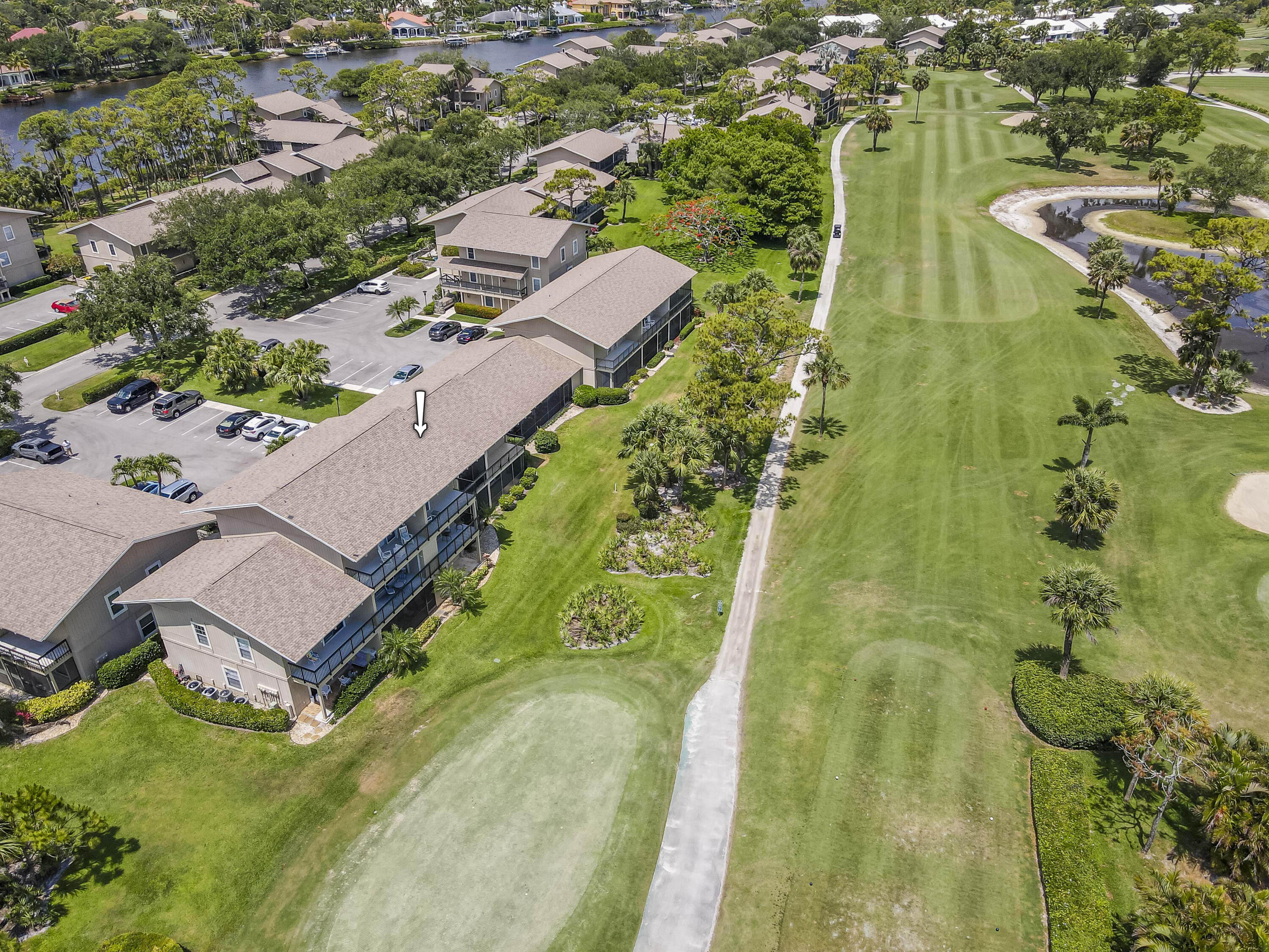 9239 Southeast Riverfront Terrace, Unit D Jupiter, FL 33469 - Photo 23 of 33 an aerial view of residential houses with outdoor space