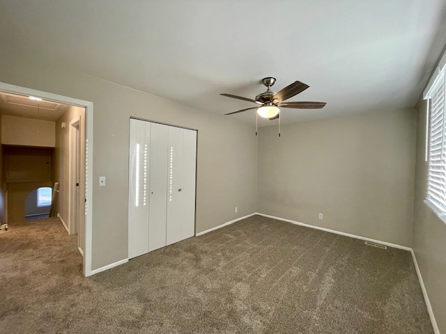355 Pearson Circle Naperville, IL 60563 - Photo 12 of 19 an empty room with window and ceiling fan
