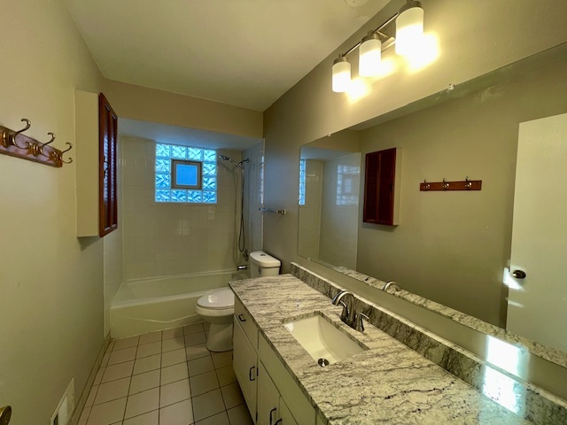355 Pearson Circle Naperville, IL 60563 - Photo 16 of 19 a bathroom with a granite countertop sink toilet and shower